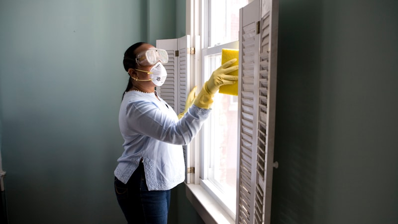 Homeowner painting a wall during a DIY project