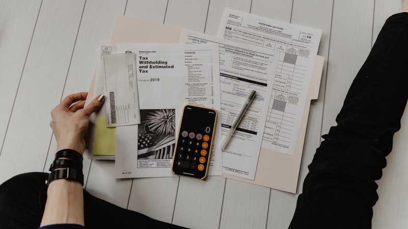 Calculator and budget documents for a home remodel